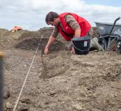 Fouilles et étude d'un vestige de four datant du Haut Moyen Âge (VIIIe-XIIe siècles) en cours de fouille. 